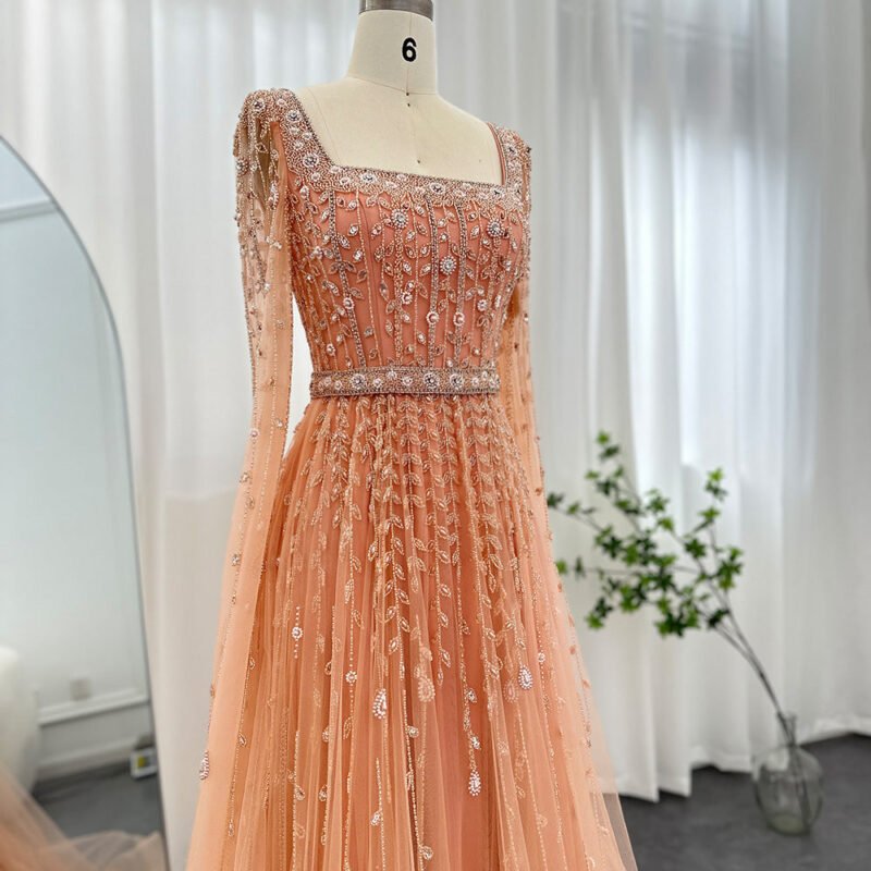Floor-Length Orange Evening Dress with Long Sleeves, Square Neckline, and Dramatic Cape Sleeves