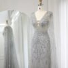 Luxury Aqua Mermaid Evening Gown – V-Neck Design with Cape Sleeves