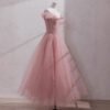 Sparkling Pink Tulle Gown with Sequin Embellishments