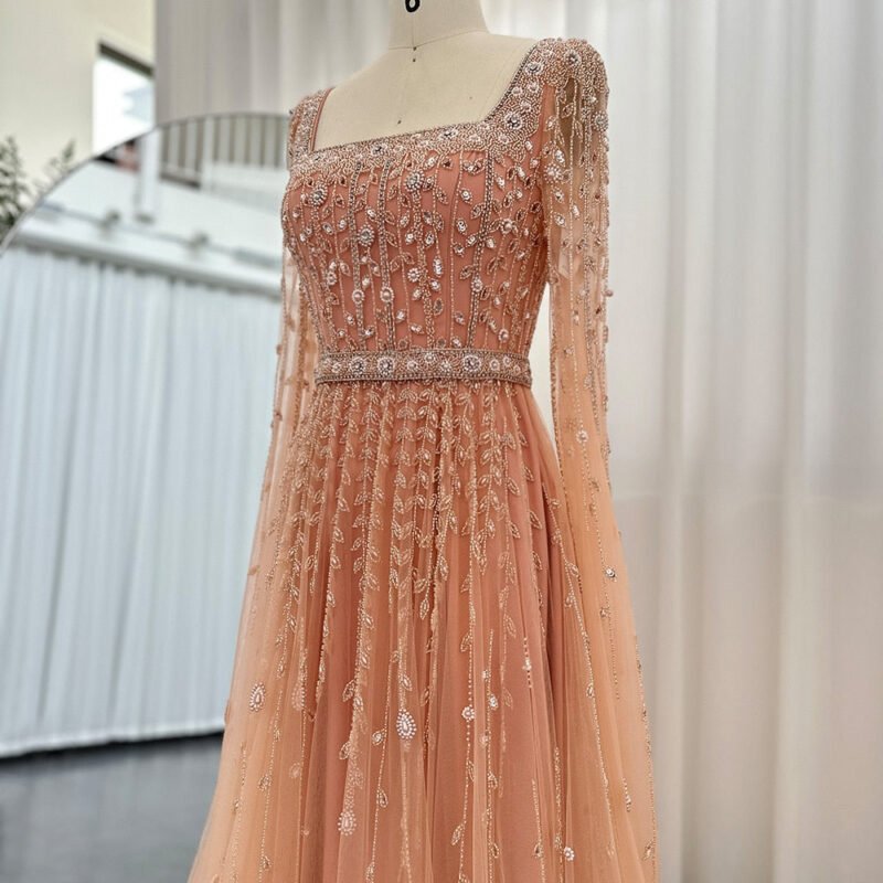 Floor-Length Orange Evening Dress with Long Sleeves, Square Neckline, and Dramatic Cape Sleeves