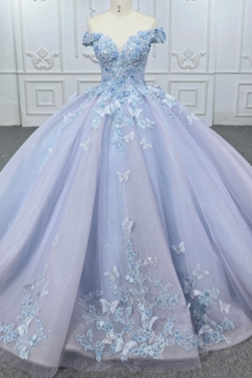 Dusty Blue Quinceanera Ball Gown with Off-Shoulder Neckline and Applique Tulle