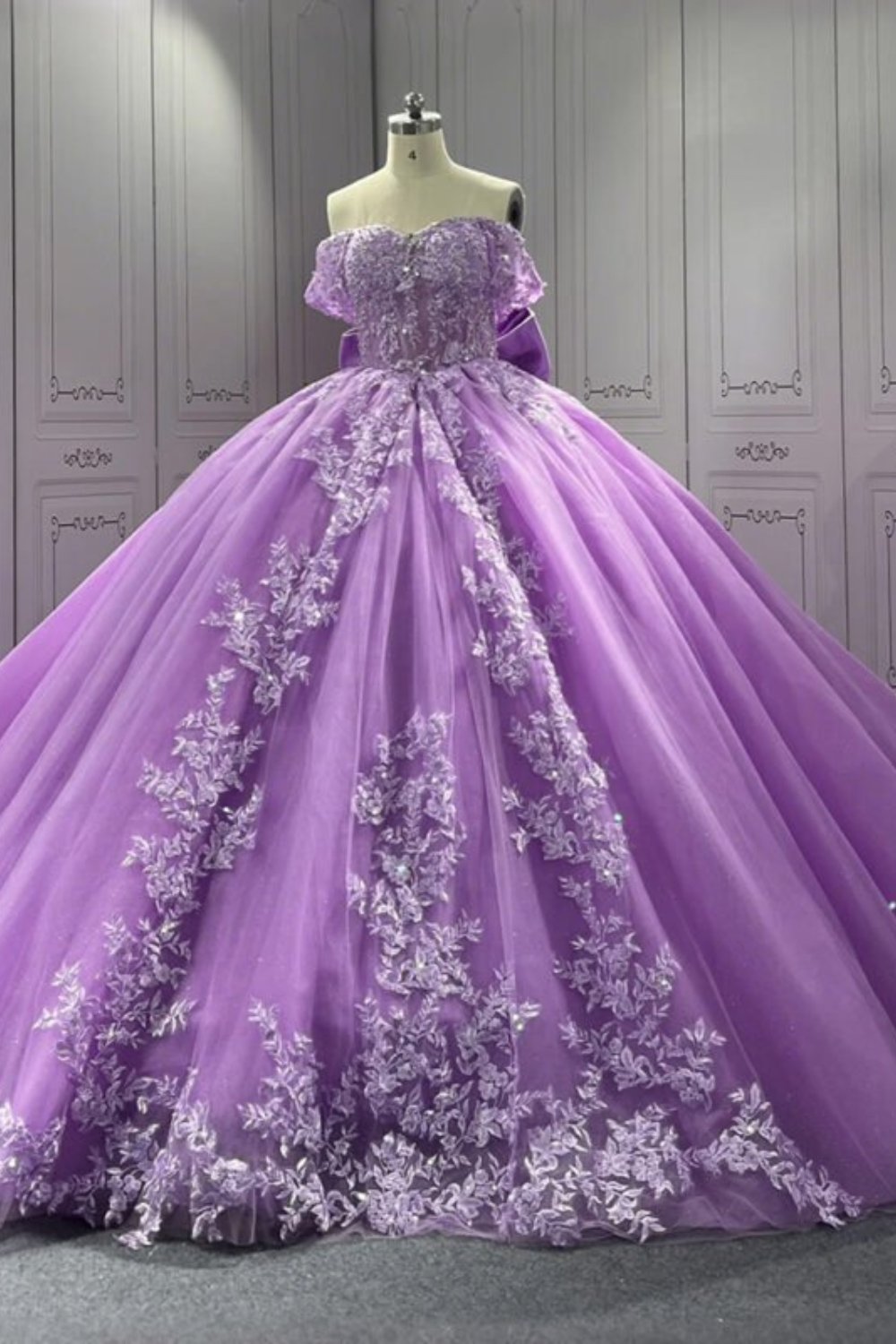 Elegant Purple Off-Shoulder Quinceanera Dress with Back Bow